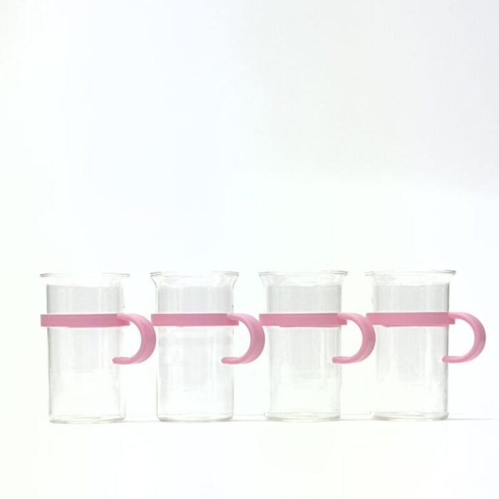 1980s hot beverage glasses with pink carriers by bodum set of 4 0234