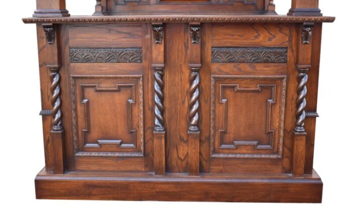 20th century jacobean style english carved oak bar 1419