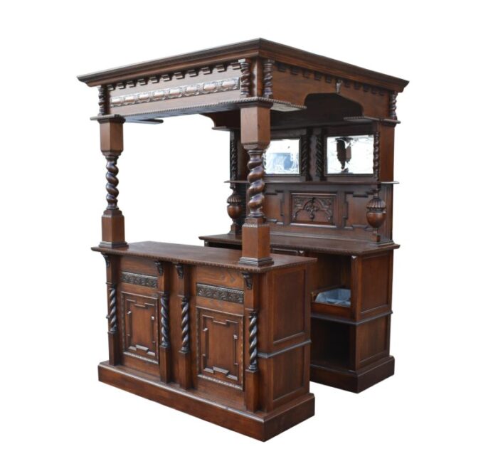 20th century jacobean style english carved oak bar 2586