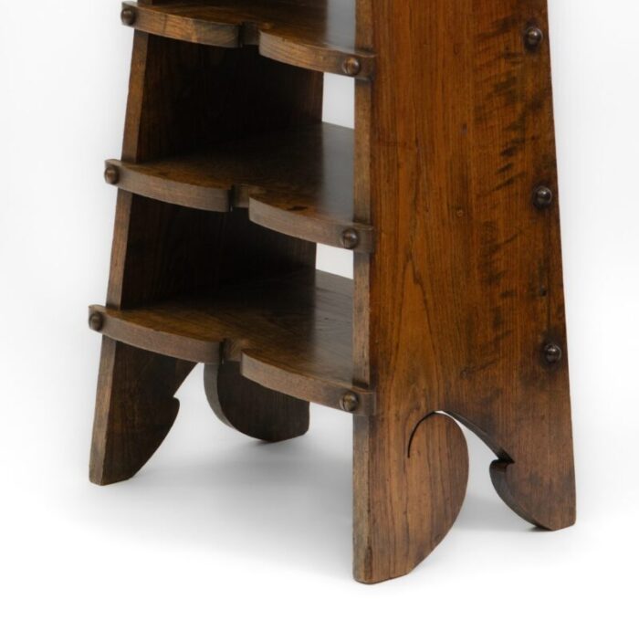 american arts crafts oak paper rack in the style of charles rohlfs 1900s 12