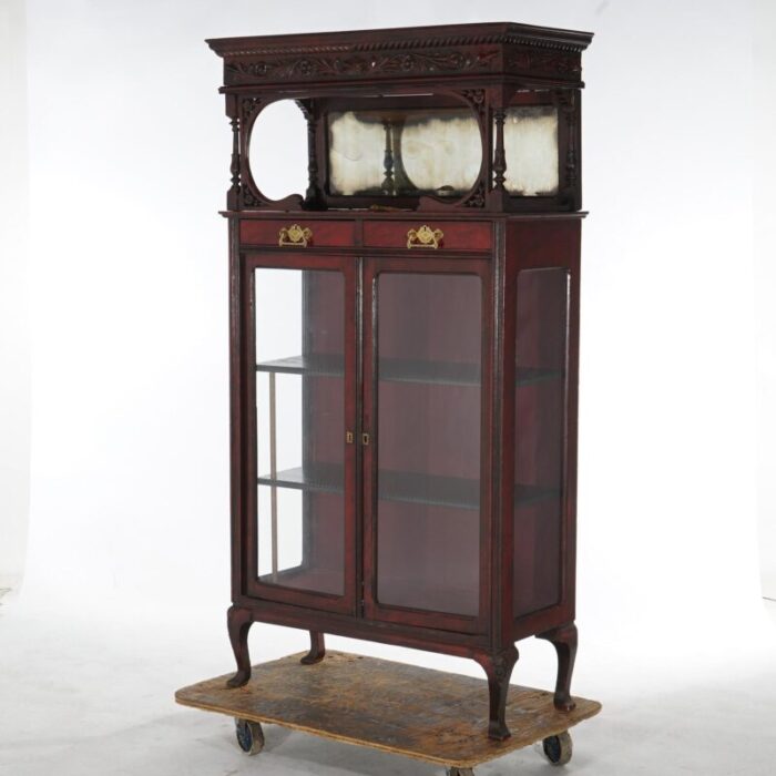 antique carved mahogany two door and two drawer mirrored china cabinet c1910 8101