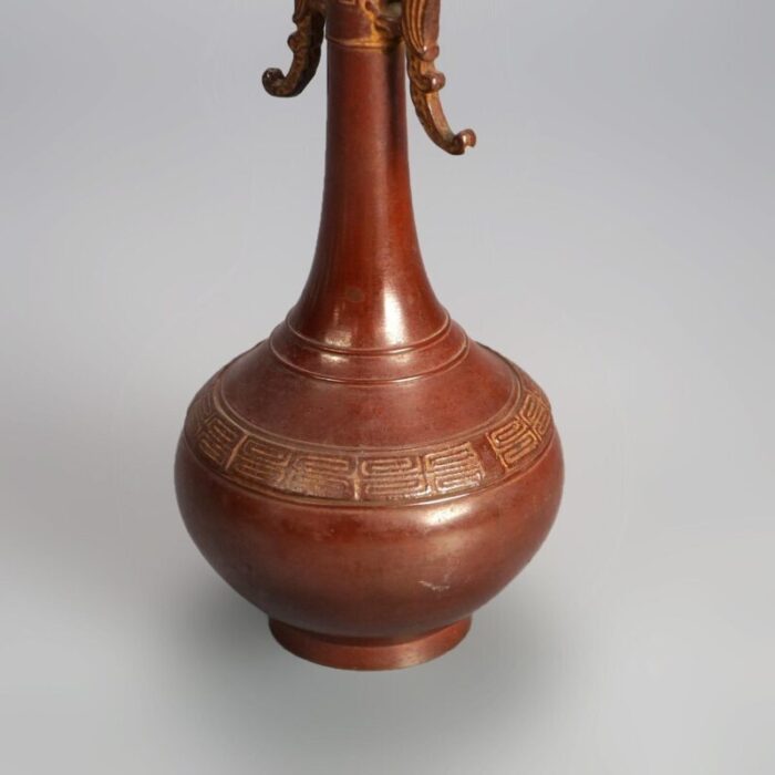 chinese bronze vase with enameled floral design and dragon handles 20th century 5500