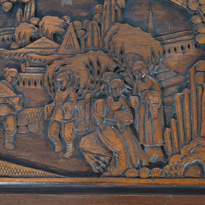 chinese carved hardwood figural blanket chest with street scene in relief 20thc 4108