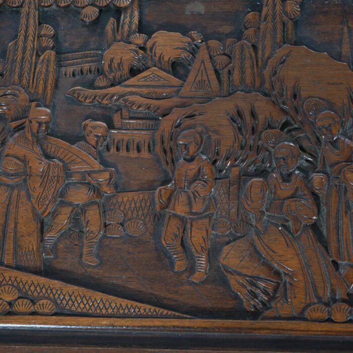 chinese carved hardwood figural blanket chest with street scene in relief 20thc 4167