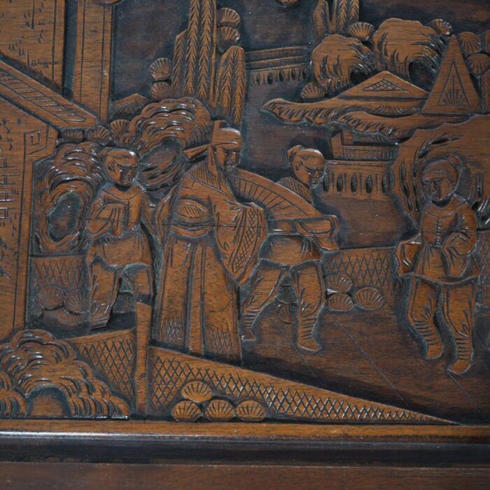 chinese carved hardwood figural blanket chest with street scene in relief 20thc 4913