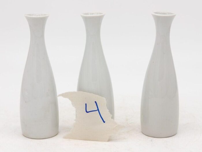 collection of three white single bud vases french early 21st c 8650