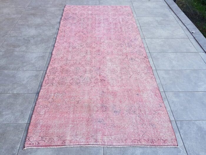 distressed nursery pink woven rug 1960s 5