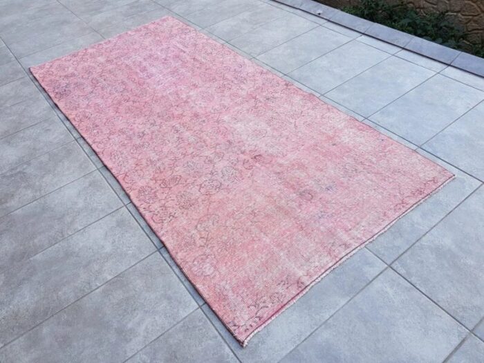 distressed nursery pink woven rug 1960s 6