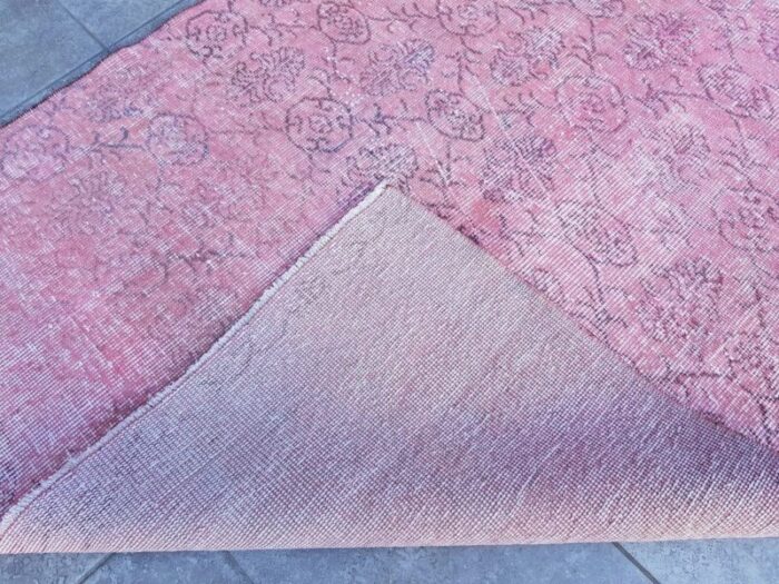 distressed nursery pink woven rug 1960s 8