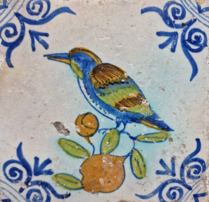 dutch antique framed delft tile with a large kingfisher bird on fruit from pottery harlingen 1640 3