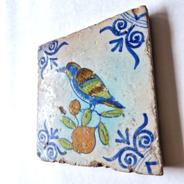 dutch antique framed delft tile with a large kingfisher bird on fruit from pottery harlingen 1640 4