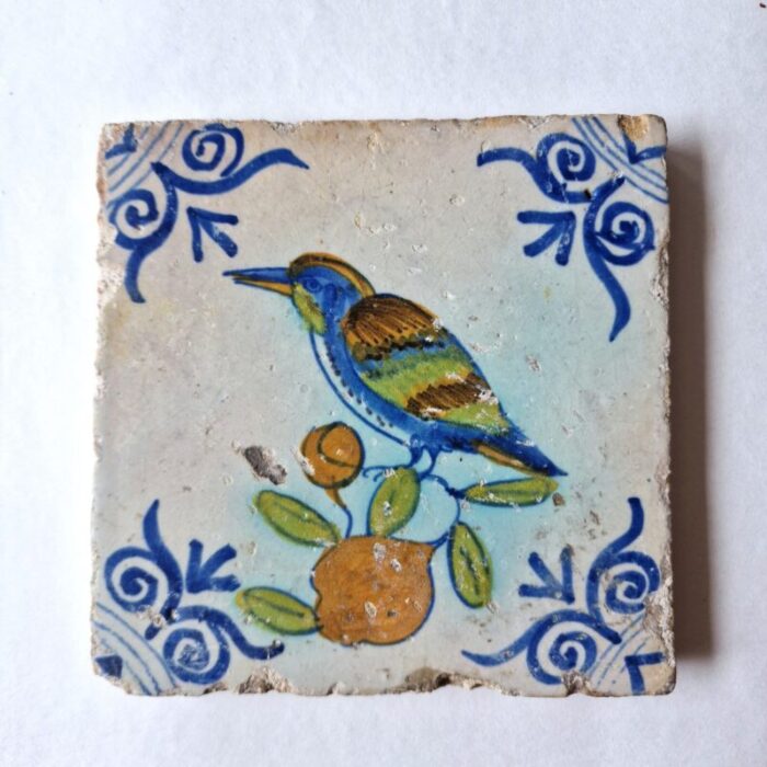 dutch antique framed delft tile with a large kingfisher bird on fruit from pottery harlingen 1640 5