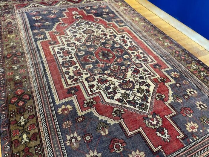 handmade faded blue and red oushak rug 1980s 2