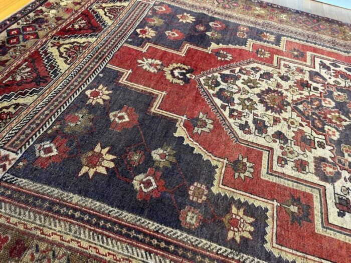 handmade faded blue and red oushak rug 1980s 3