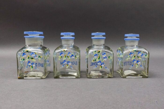 mid 20th century apothecary drug store hand painted flowers glass vanity bottles set of 4 0334