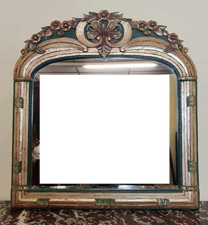 mirror in carved gilded and polychrome wood 1