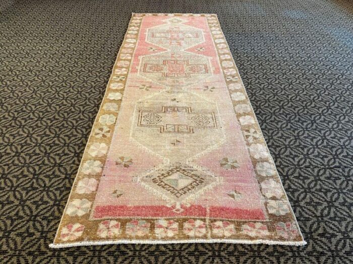 pink distressed corridor runner rug 1980s 1