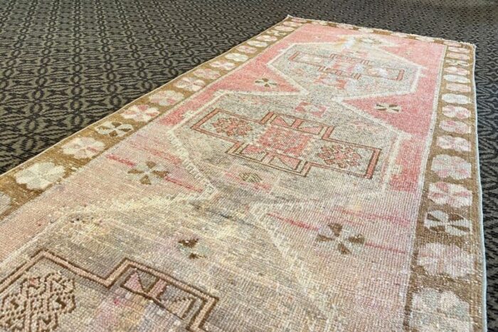 pink distressed corridor runner rug 1980s 2