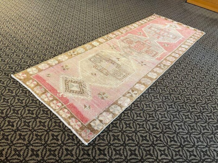 pink distressed corridor runner rug 1980s 4