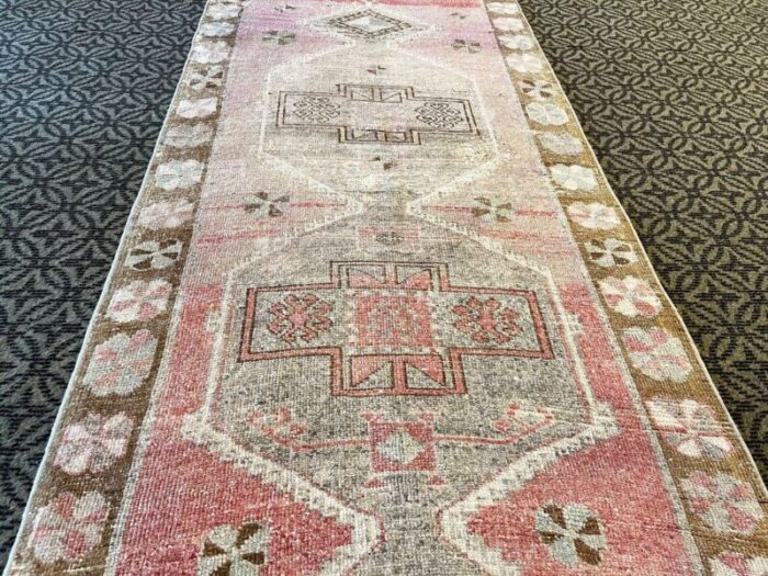 pink distressed corridor runner rug 1980s 5