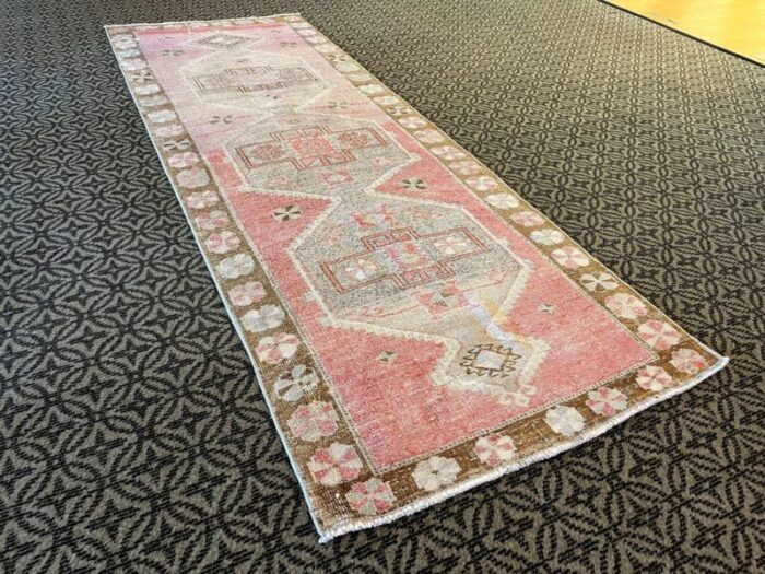 pink distressed corridor runner rug 1980s 7