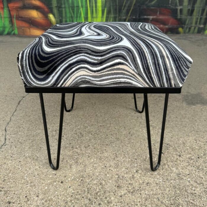 reupholstered and powder coated hairpin leg magazine rack ottoman 9928