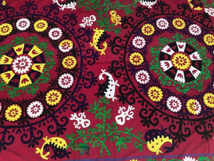 vintage handmade suzani fabric with double floral center 1960s 2