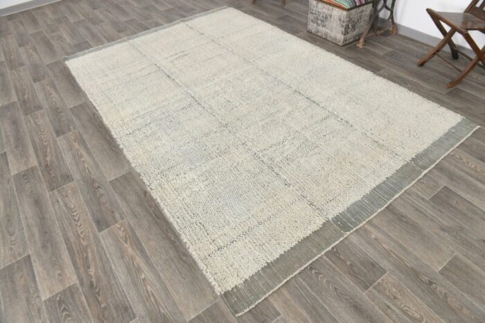 wool kilim pompom rug 1 1