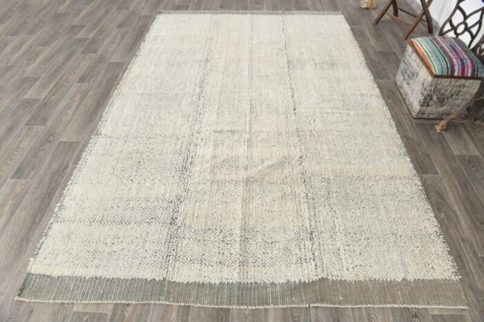 wool kilim pompom rug 2